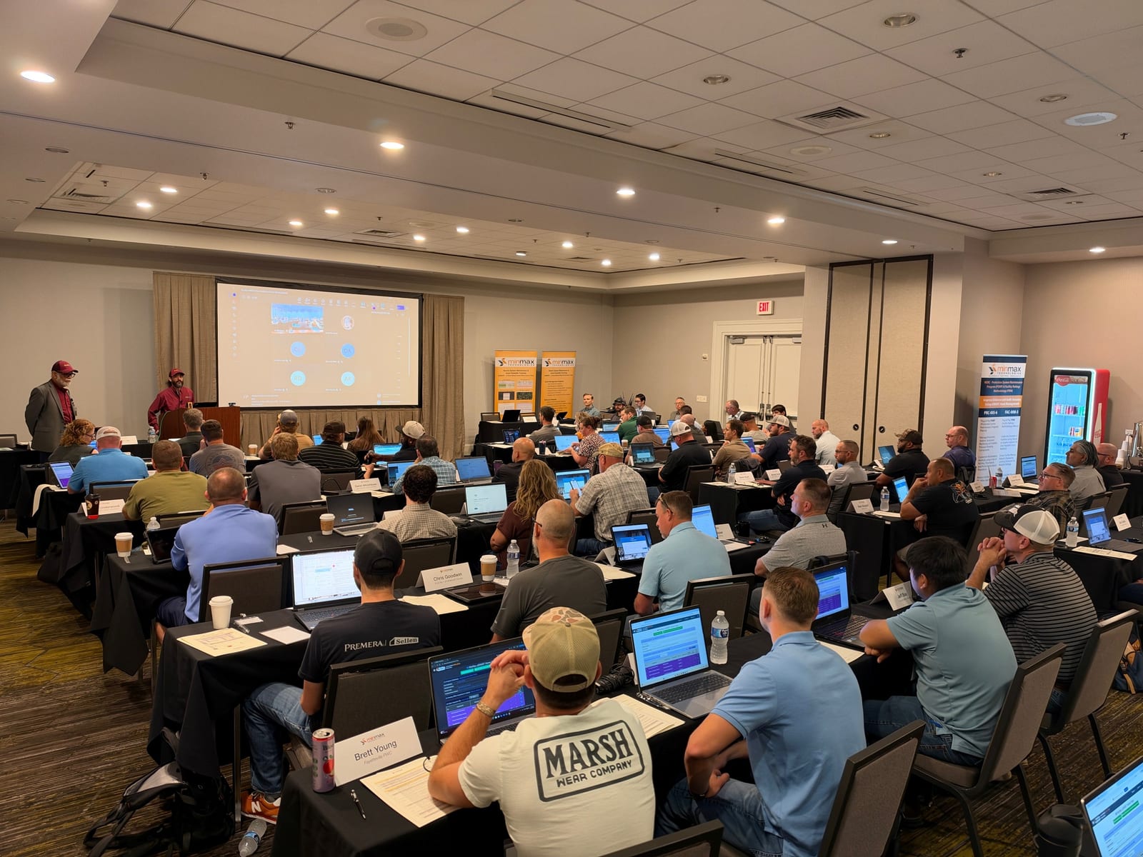Attendees working on laptops during a hands-on eSMART training session at the 2026 eSMART User Conference in Fort Worth, Texas